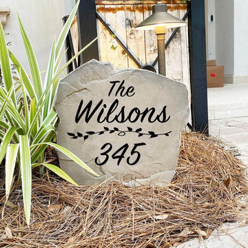 Decorative landscape stone featuring personalized house numbers and your surname, perfect for front yards, walkways, gardens, and driveways.
