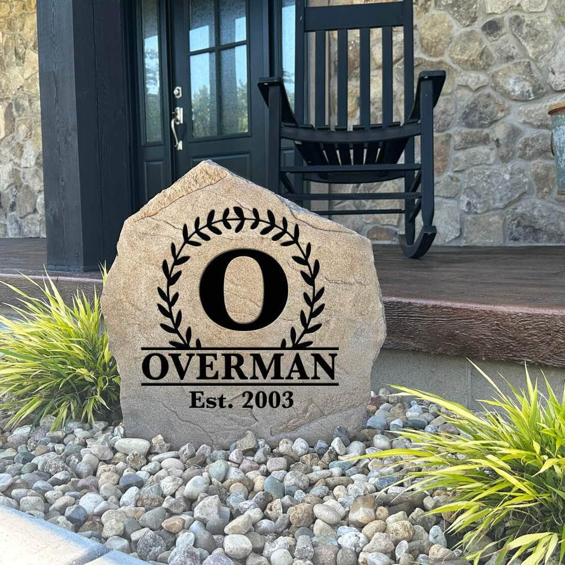 Decorative botanical monogram stone personalized with your custom initial and special date, perfect for front gardens, patios, and welcoming entryways.
