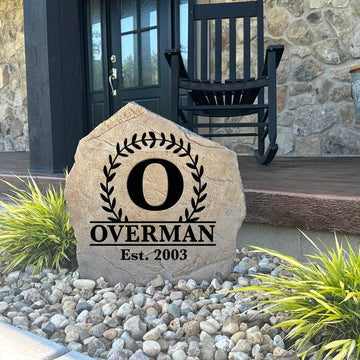 Decorative botanical monogram stone personalized with your custom initial and special date, perfect for front gardens, patios, and welcoming entryways.