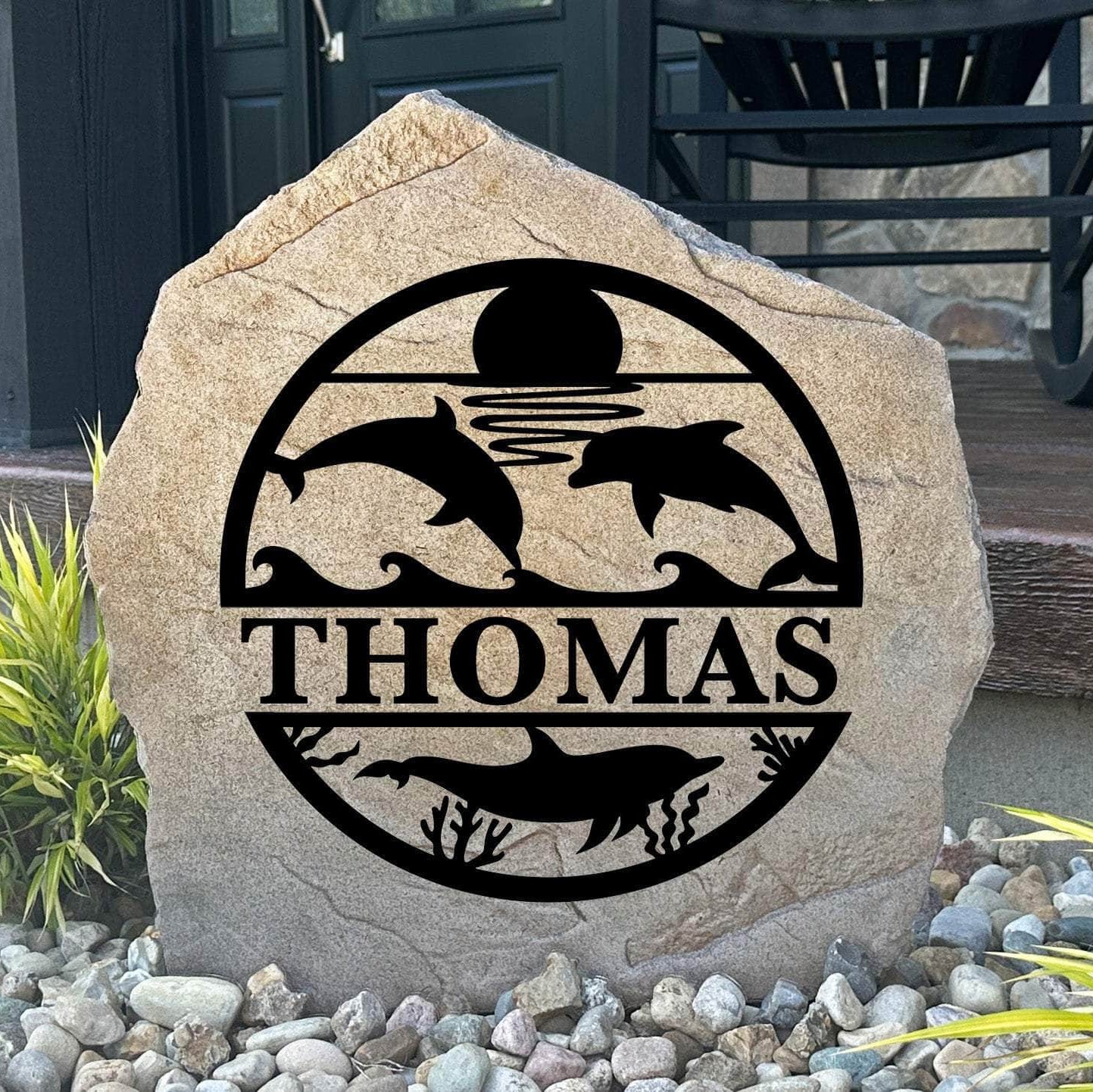 Personalized Dolphin Monogram Stone featuring a custom initial and elegant dolphin design engraved directly into the stone surface. This decorative garden stone adds coastal charm and curb appeal to beach houses, patios, gardens, and entryways.