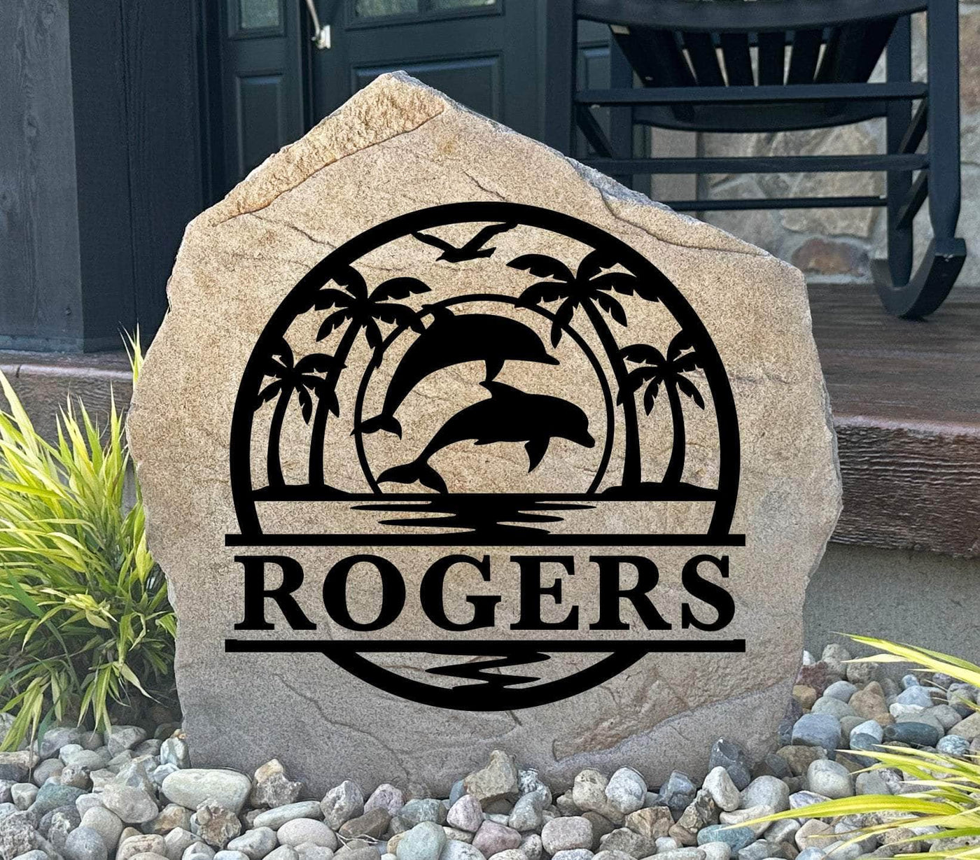 Tropical dolphin monogram stone with palm trees and personalized name, perfect for beach homes.