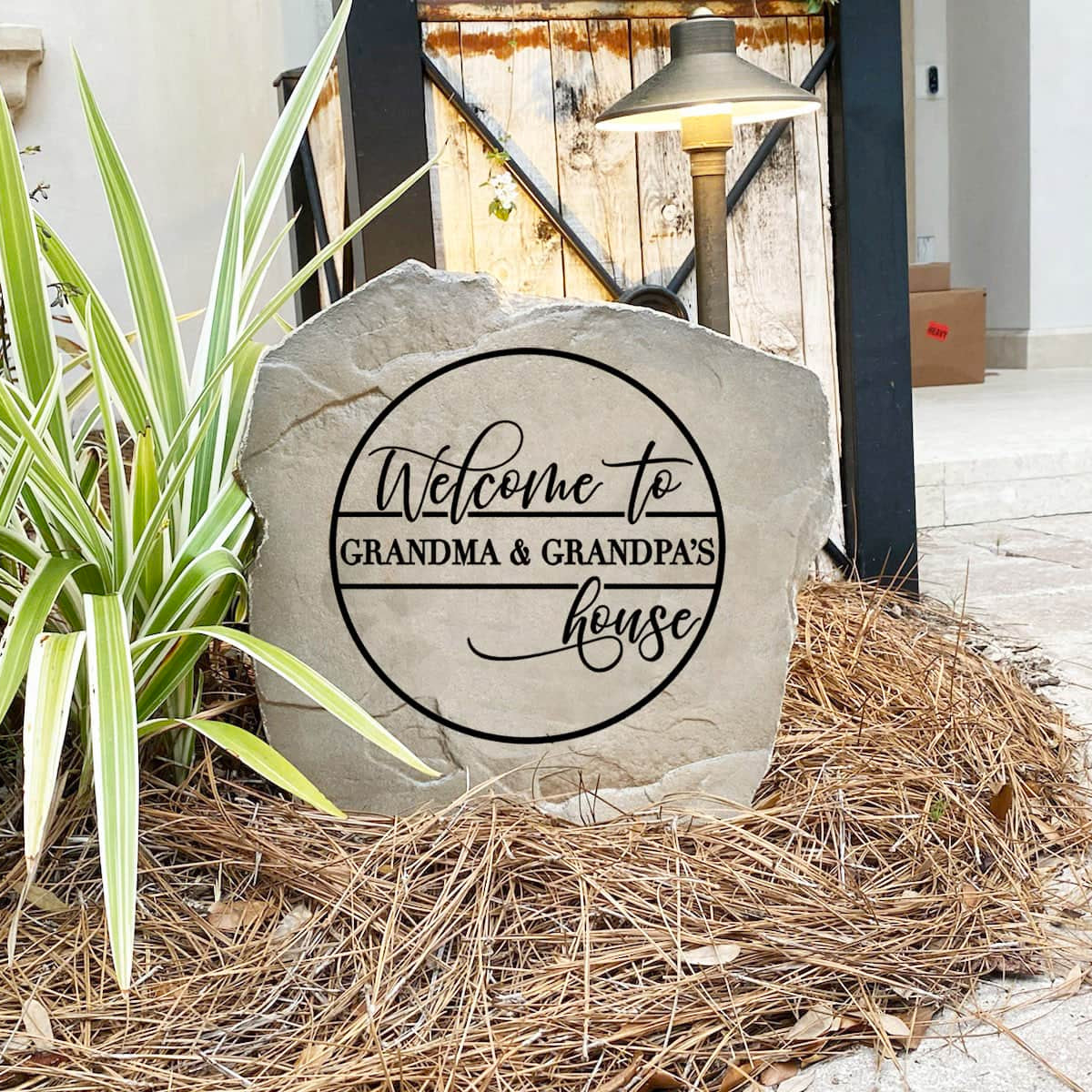 Decorative Grandma & Grandpa's House Stone featuring a heartfelt design permanently engraved into the stone surface. This weather-resistant outdoor sign brings warmth and personality to front yards, entryways, and landscape beds.