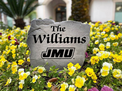 Engraved stone with James Madison University logo and the family name