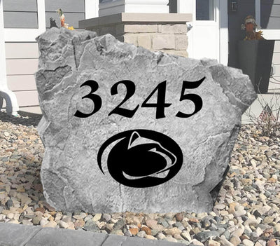 Decorative rock featuring house number and Penn State emblem