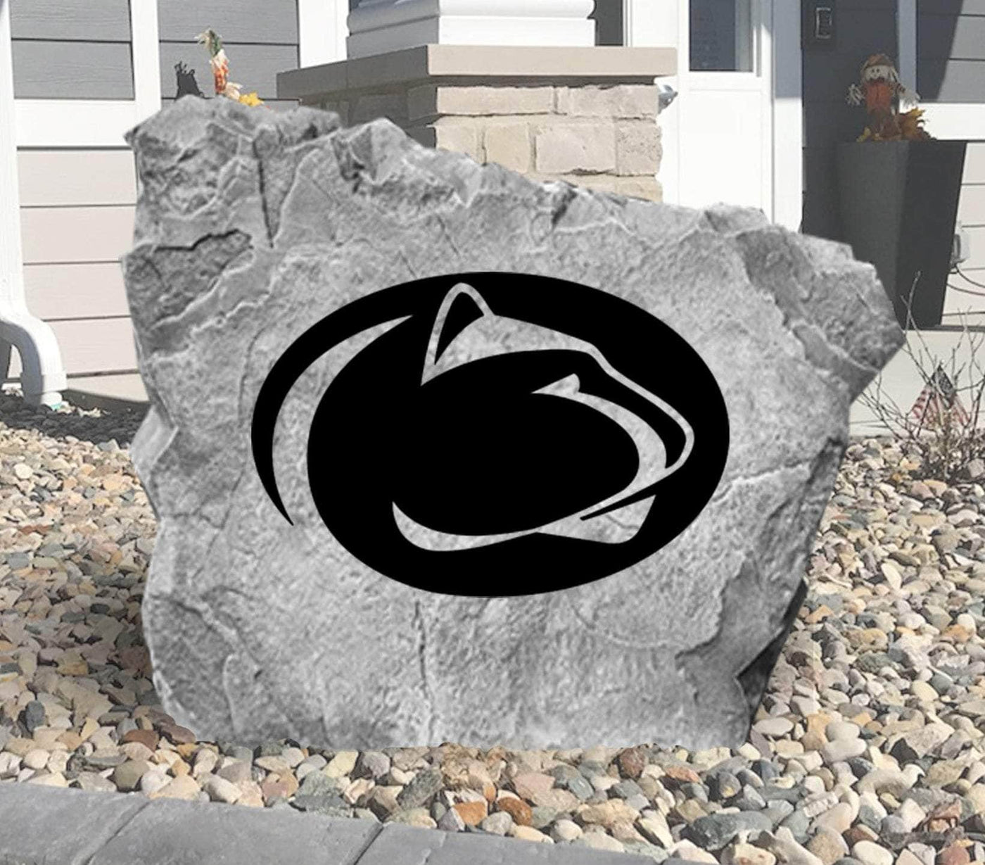 Outdoor decorative rock with Penn State University emblem