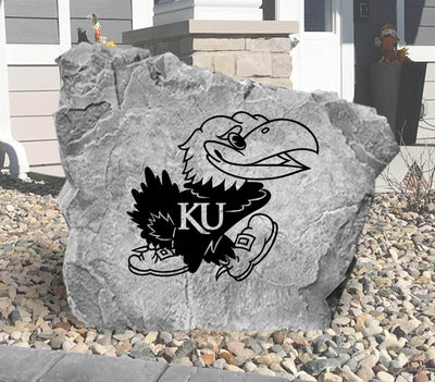 Decorative yard rock featuring KU Jayhawk emblem
