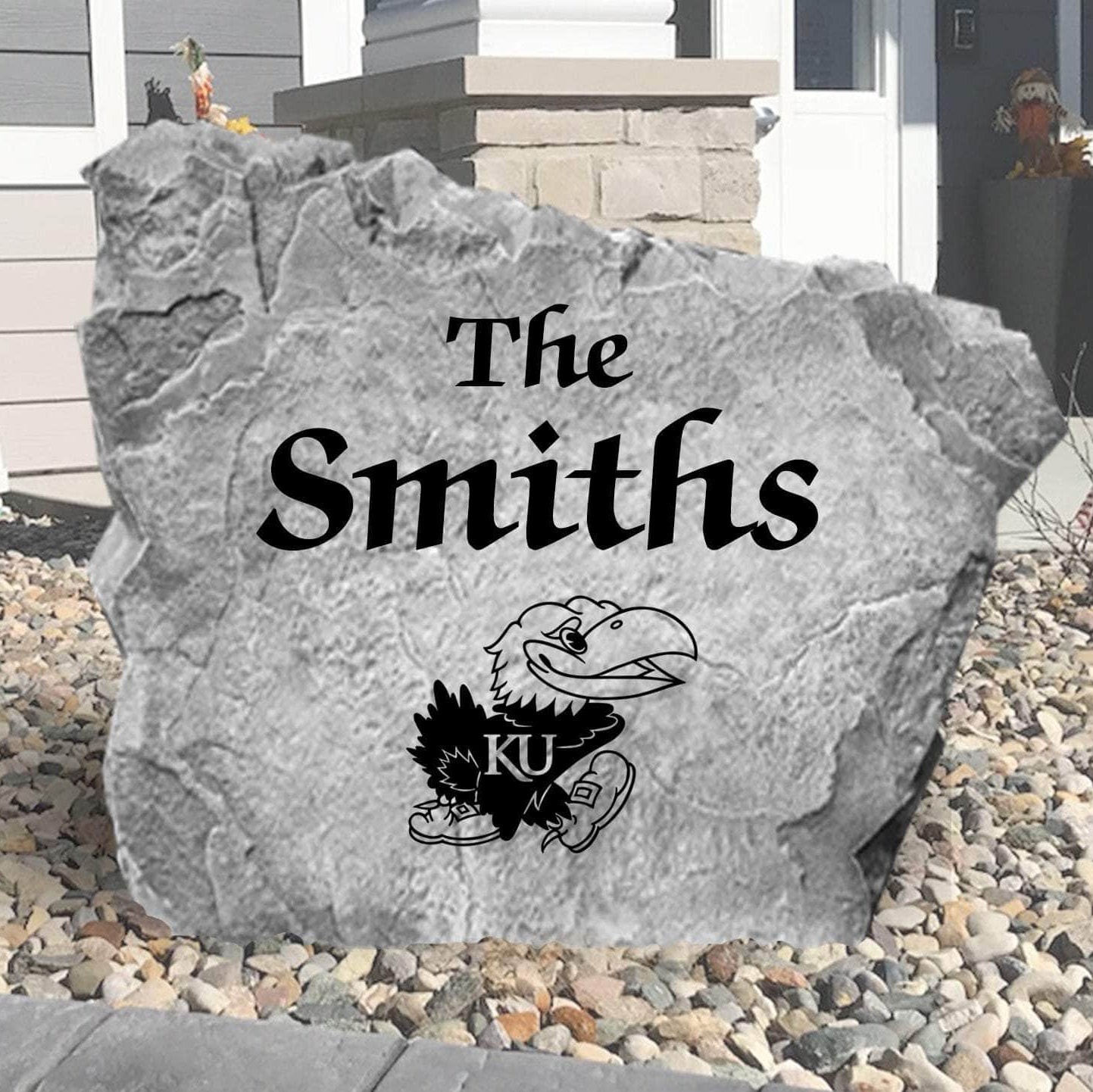 Custom University of Kansas Jayhawks Name Stone featuring the official university logo and your personalized family name. A beautiful landscape accent for gardens, patios, front entryways, and flower beds.