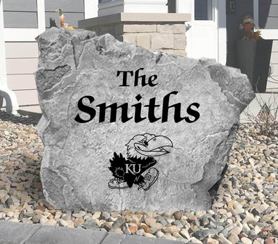 Engraved yard rock with KU Jayhawk emblem and personalized family name