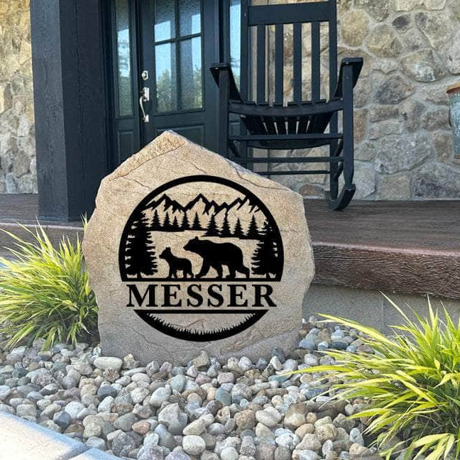 Decorative Bear Monogram Stone featuring detailed bear artwork and a custom monogram permanently engraved into the stone surface. Perfect for cabins, gardens, and entryways, this outdoor accent adds timeless woodland appeal.