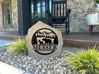 Elegant engraved stone with bear family design, adds charm to gardens and entryways.