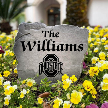 Officially licensed Ohio State Buckeyes Name Stone handcrafted in the USA with custom family engraving and detailed team artwork. This decorative garden stone enhances landscape beds, patios, and outdoor living spaces with lasting beauty and school spirit.