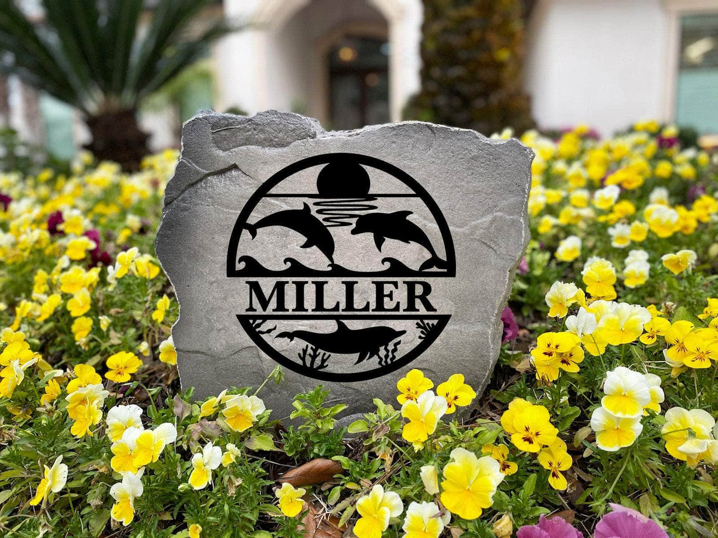 Custom outdoor rock with dolphins and sunset, a great gift for ocean enthusiasts.