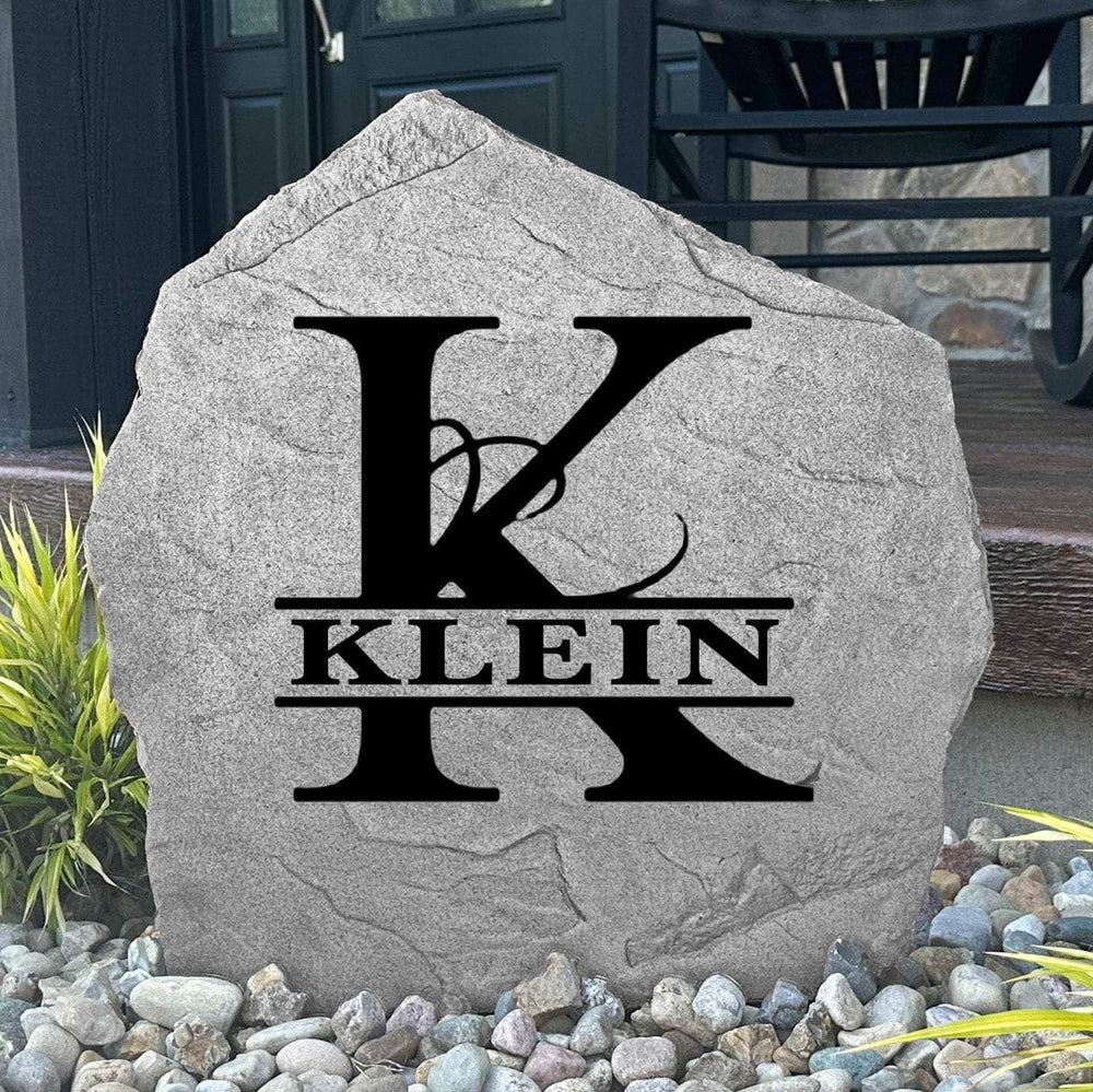 Custom ornate monogram plaque crafted from durable concrete, blending sophisticated design with timeless outdoor beauty and lasting craftsmanship.
