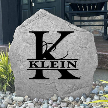 Custom ornate monogram plaque crafted from durable concrete, blending sophisticated design with timeless outdoor beauty and lasting craftsmanship.