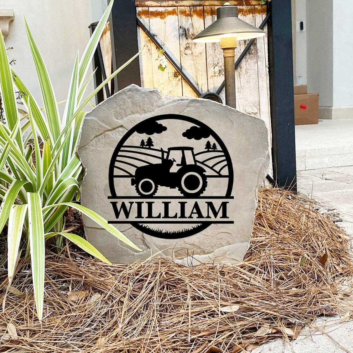 Engraved Farm Monogram Stone nestled among natural greenery and colorful flowers, bringing rustic elegance and personalized style to front yard landscapes and outdoor living spaces.