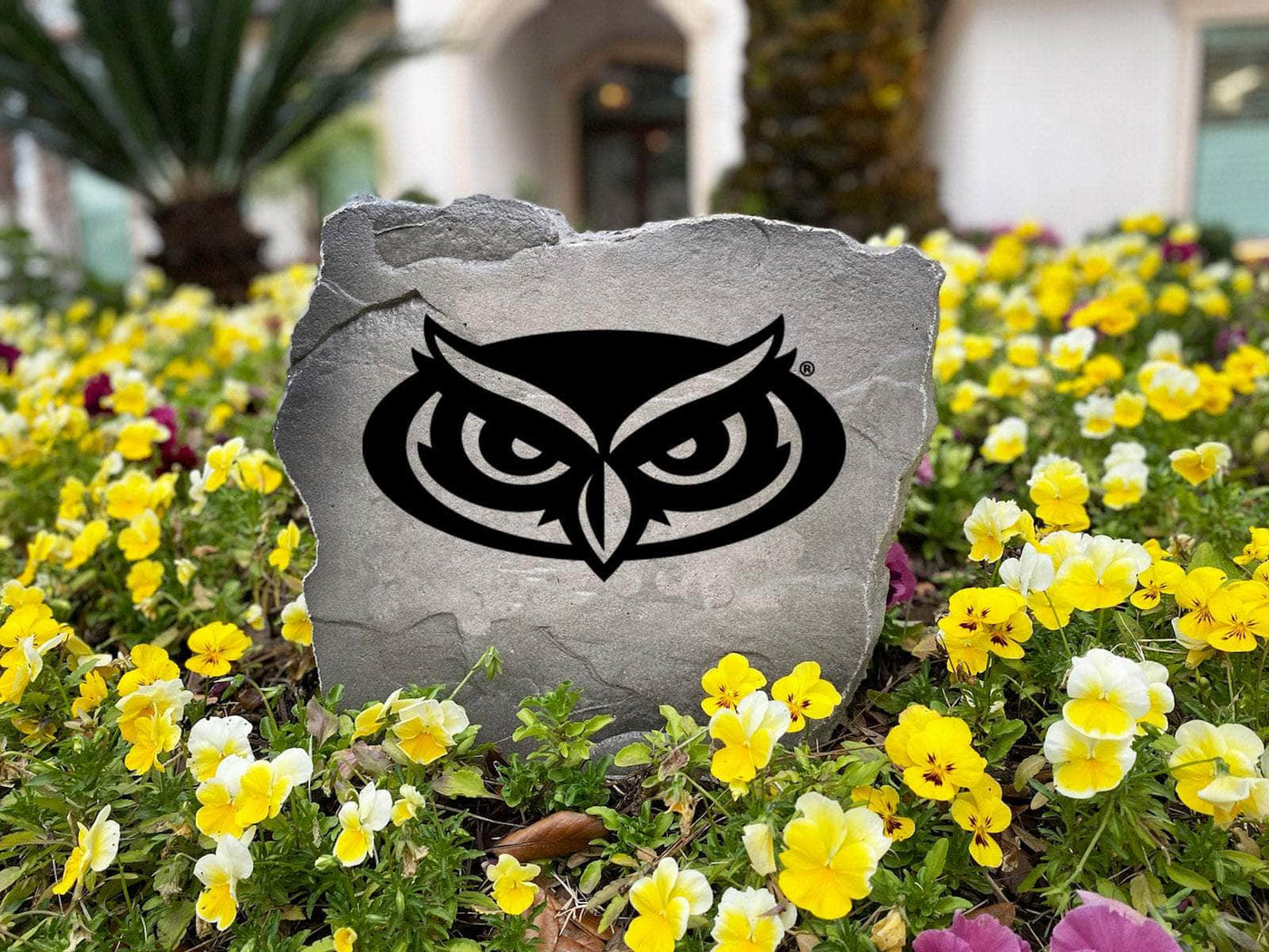 Outdoor stone engraved with Florida Atlantic University logo