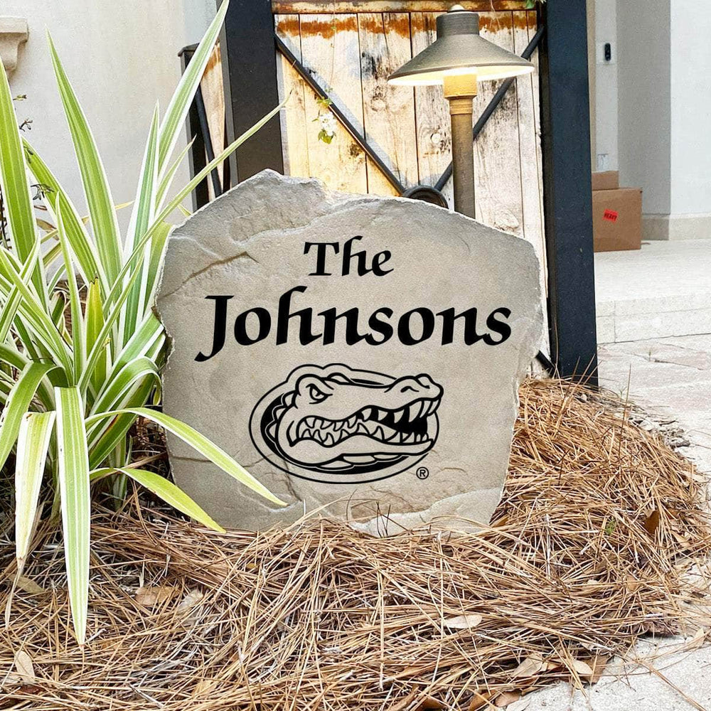 Custom Florida Gators landscaping stone with engraved family name design.