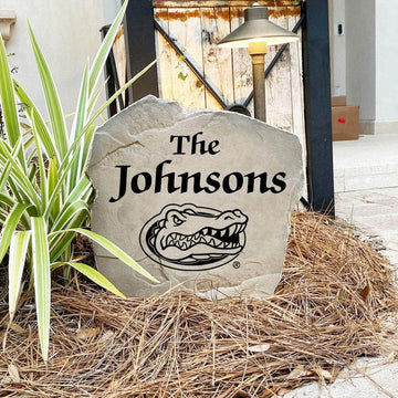 Custom Florida Gators landscaping stone with engraved family name design.