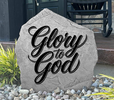 Engraved garden stone featuring Glory To God message.