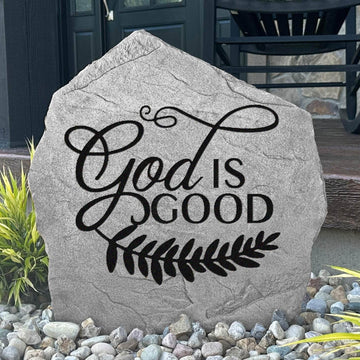 Inspirational Christian garden plaque displaying "God Is Good" with graceful vine accents, crafted from durable concrete for lasting outdoor beauty.