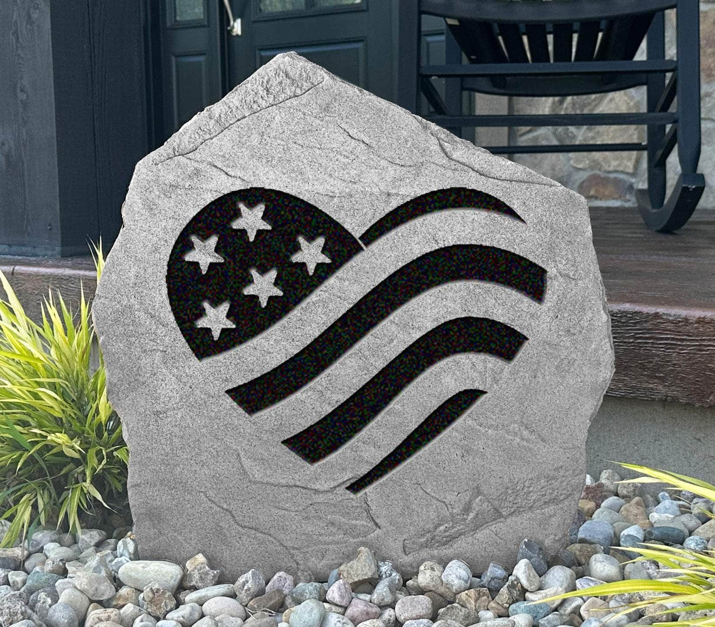 Personalized patriotic stone featuring heart and flag engraving