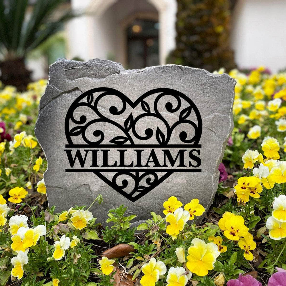 Personalized Heart Monogram Stone handcrafted in the USA with elegant heart artwork and custom engraving. This decorative garden stone enhances flower beds, walkways, and landscape borders with timeless style.