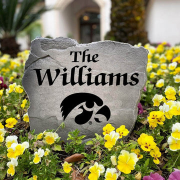 Personalized University of Iowa outdoor name stone featuring custom family lettering permanently engraved into premium stone. A unique gift for Hawkeyes fans, alumni, graduates, housewarmings, and football enthusiasts.