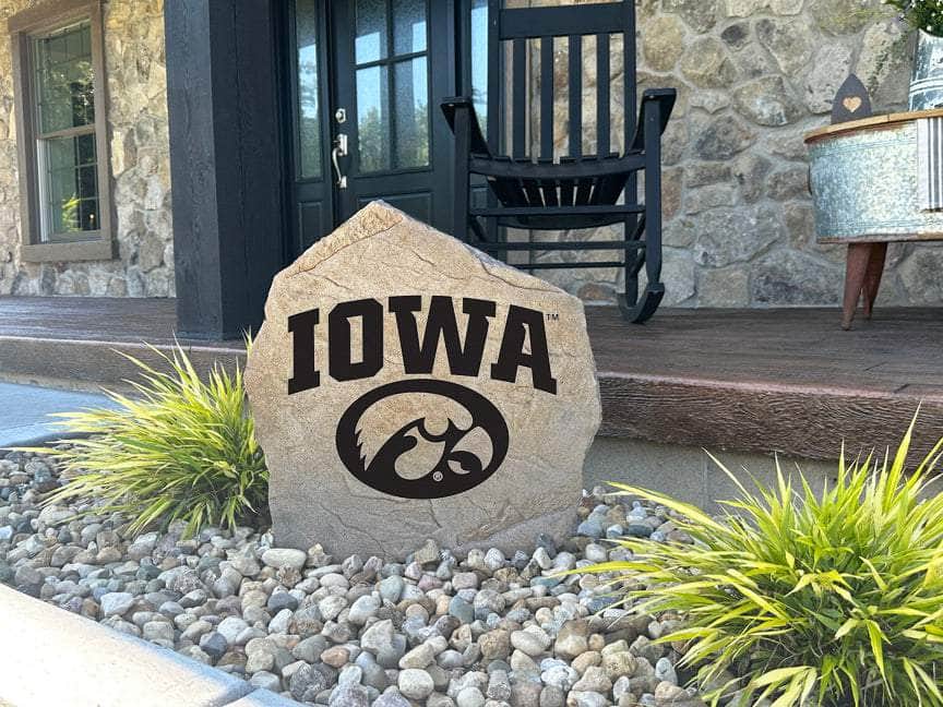 Decorative stone with bold Iowa Hawkeyes emblem