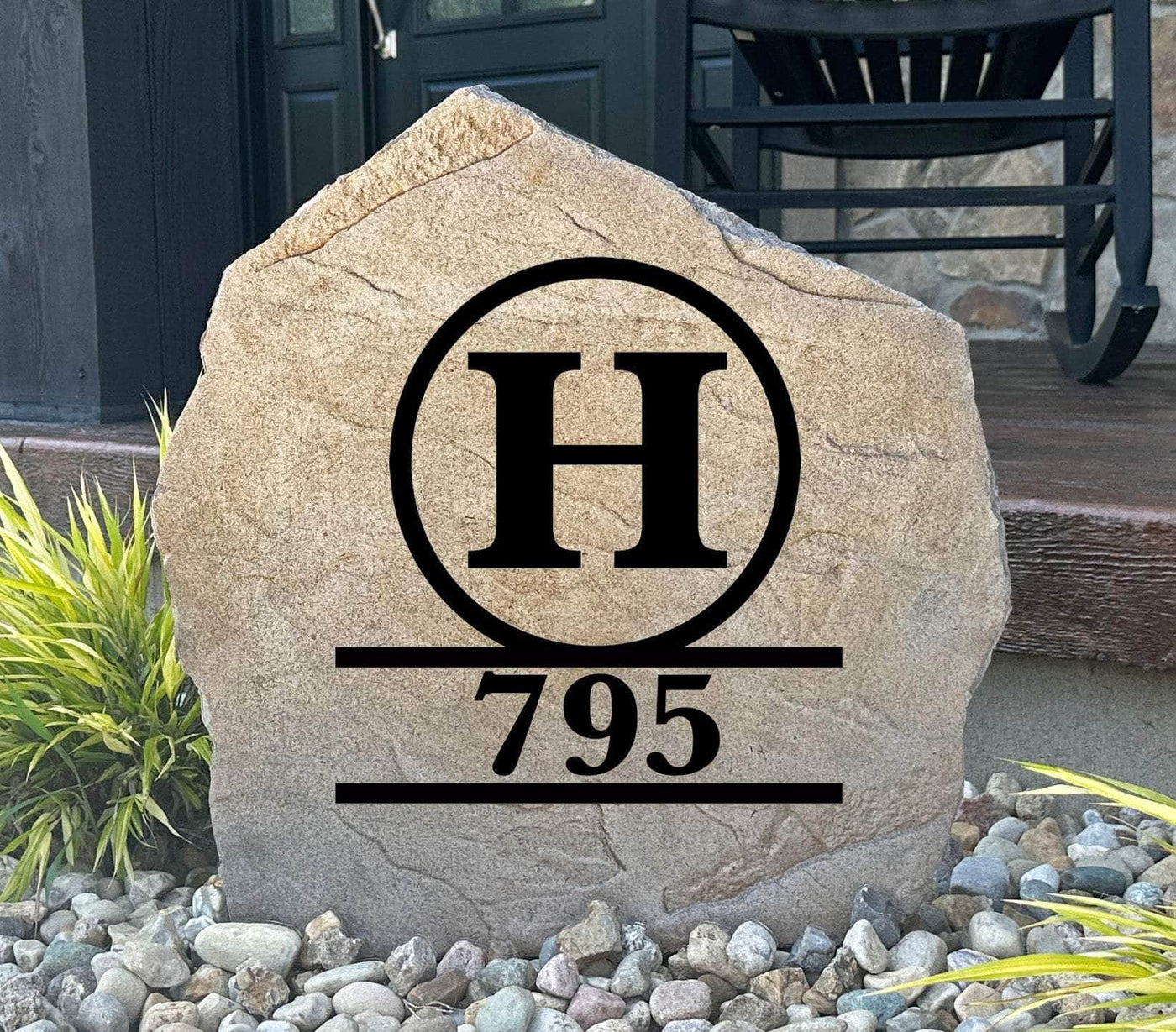 Custom engraved monogram stone featuring initial and address design