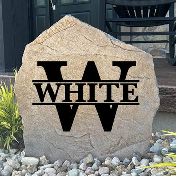 Custom monogram plaque crafted from durable concrete, adding elegant personalization and lasting beauty to your home's landscape.