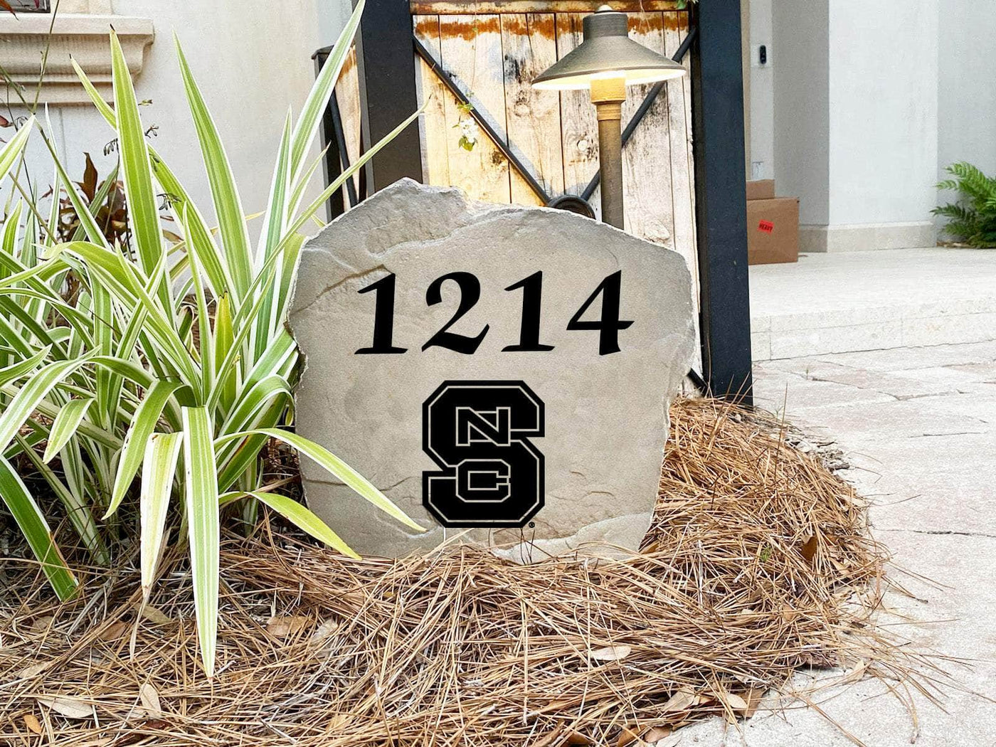 Decorative landscaping stone showcasing NC State University pride