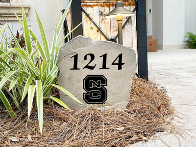 Decorative landscaping stone showcasing NC State University pride