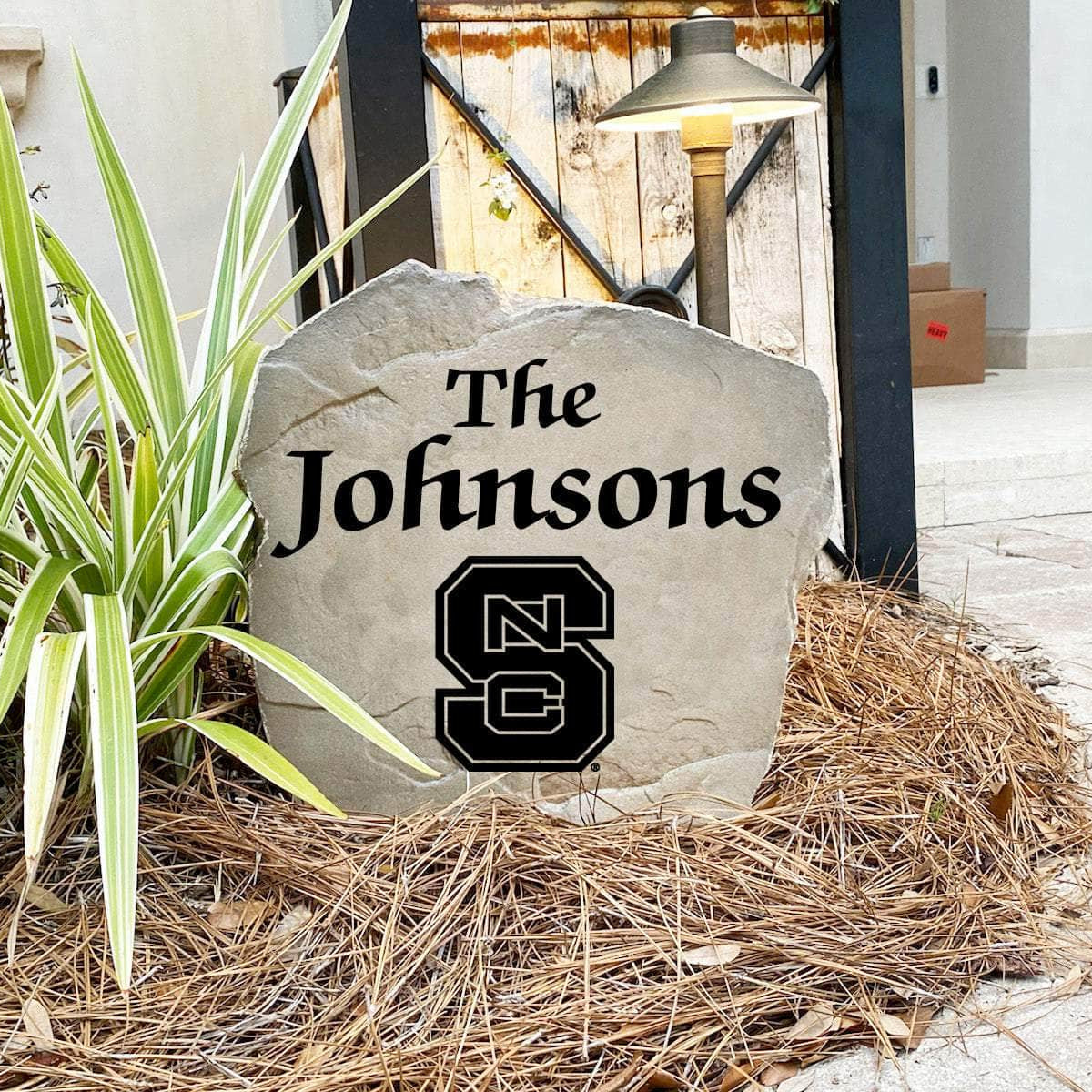 Handcrafted in the USA, this North Carolina State University Name Stone features officially licensed collegiate artwork with deep precision engraving. Available in Sandstone and Greystone finishes for lasting outdoor durability.