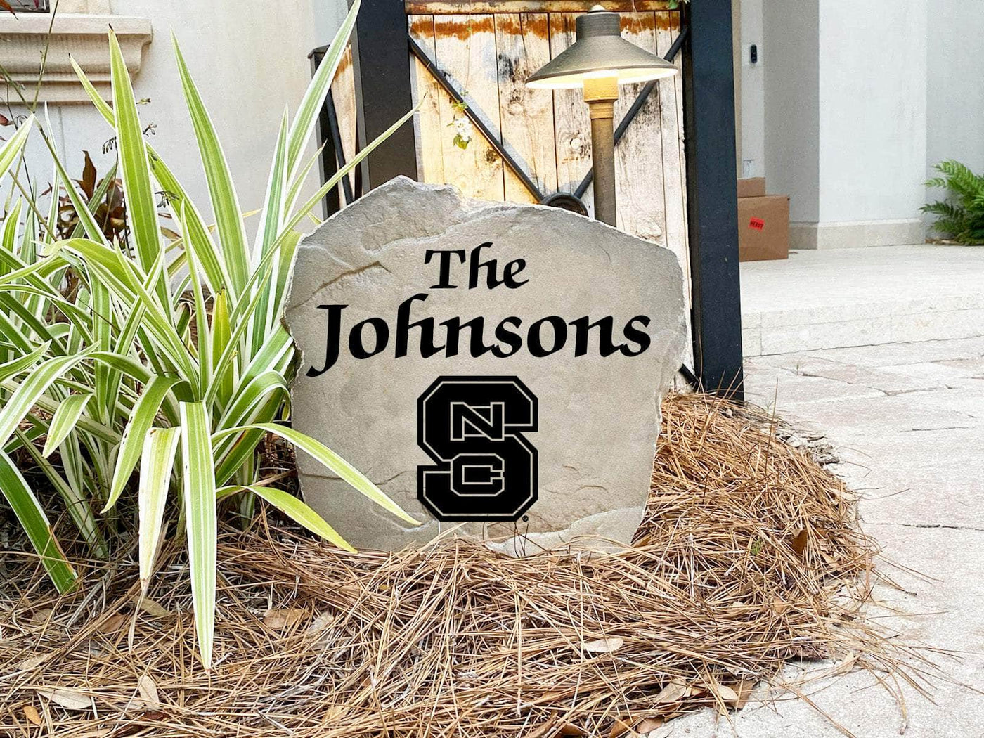 Decorative landscaping stone displaying NC State University name