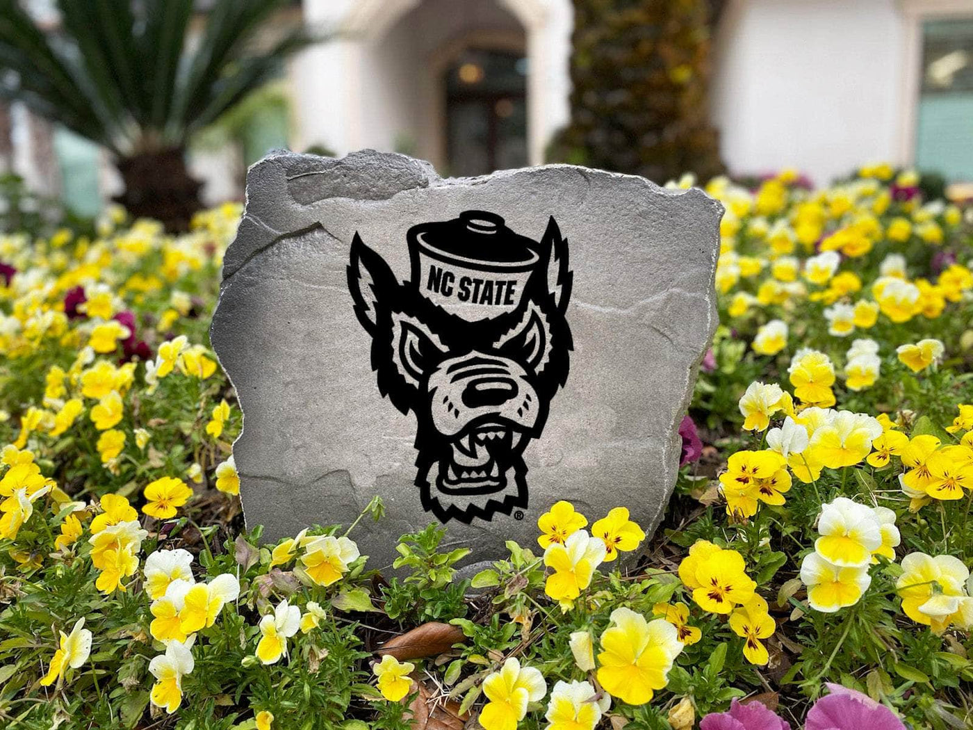 Outdoor stone featuring detailed NC State University logo engraving