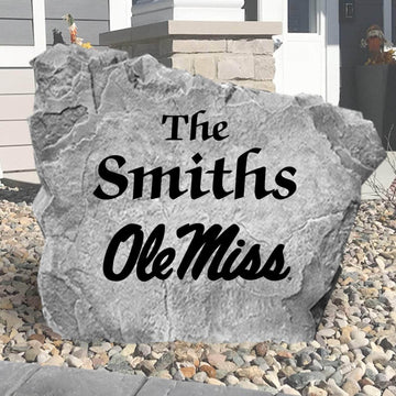 Custom Ole Miss Rebels Name Stone featuring the official university logo and personalized family lettering. A beautiful landscape accent for gardens, patios, flower beds, and front walkways.