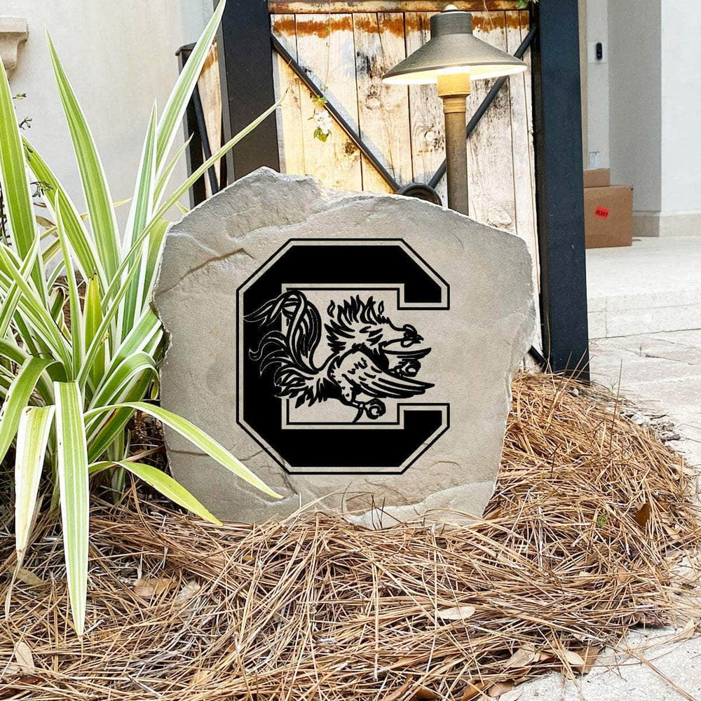 Handcrafted in the USA, this University of South Carolina Logo Stone features deep precision engraving and weather-resistant construction. Available in Sandstone and Greystone finishes for lasting outdoor beauty.
