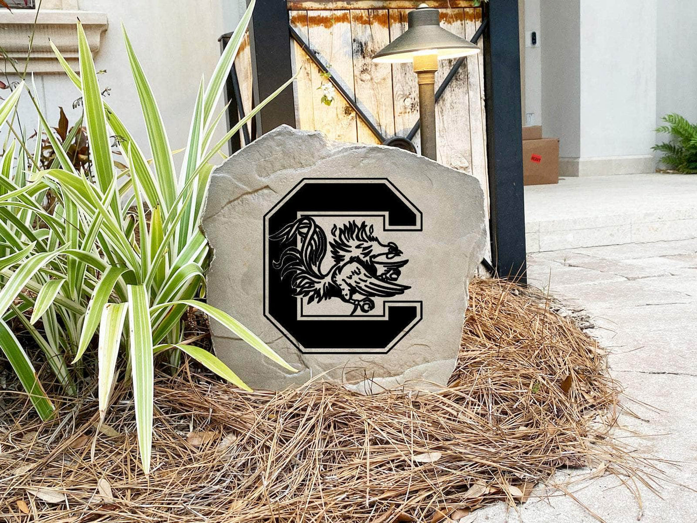 University of South Carolina logo engraved on durable stone for landscaping