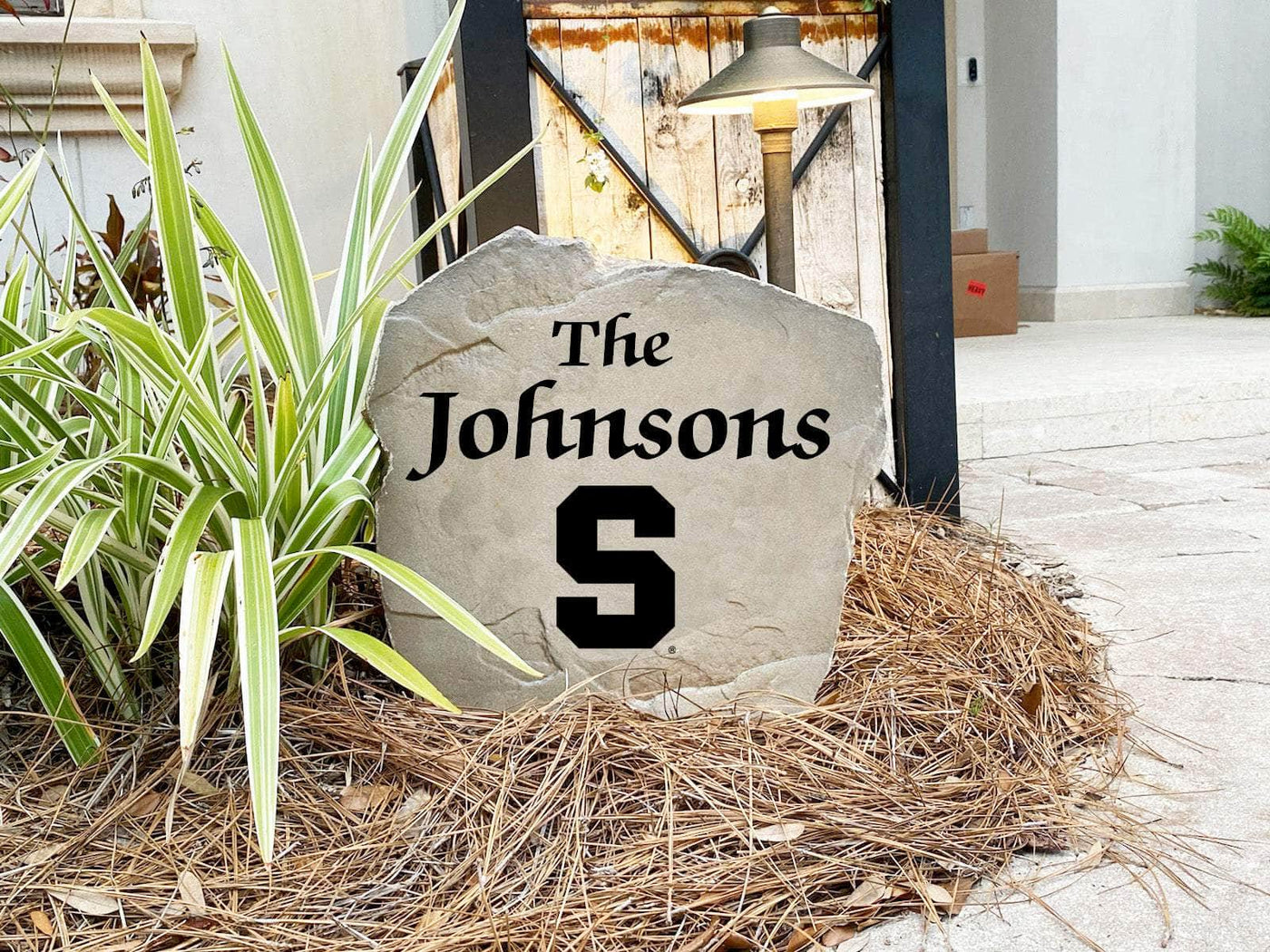 Decorative Syracuse University family name stone for entryway