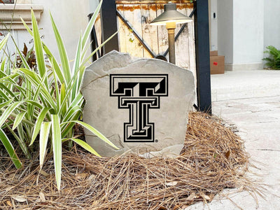Decorative stone engraved with Texas Tech University logo