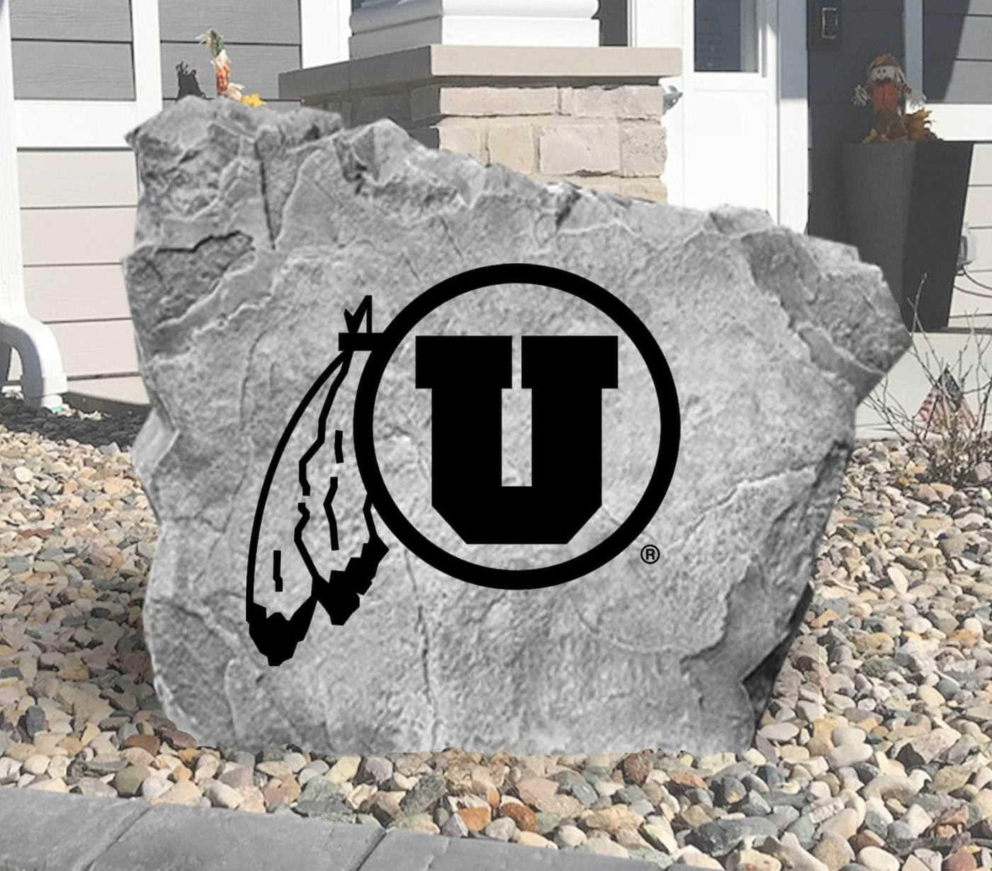 Outdoor yard rock with custom engraved University of Utah logo.