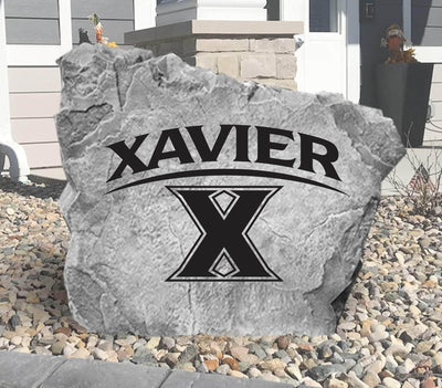 Personalized Xavier University logo rock for front yard display