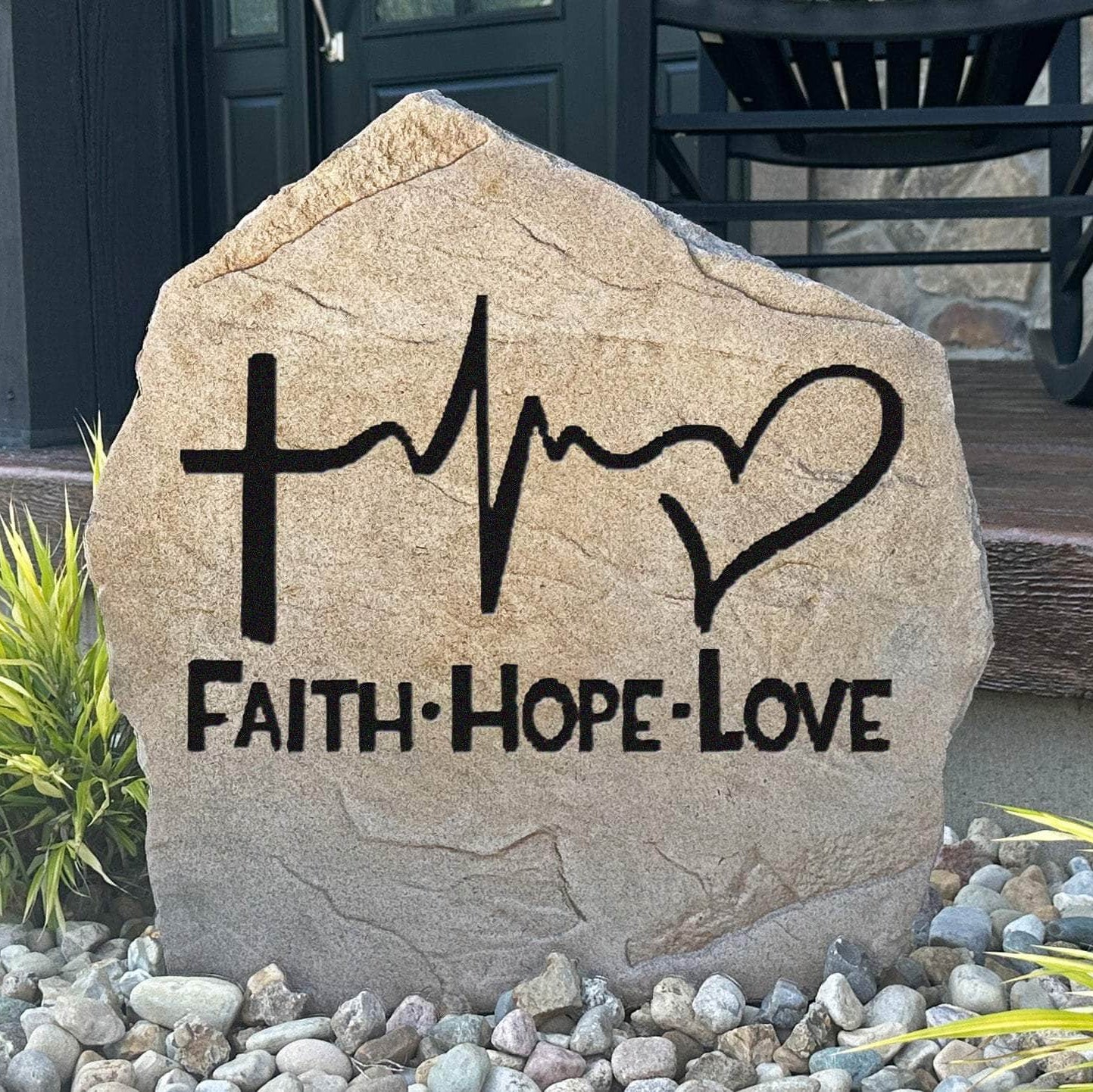 Faith Hope Love engraved garden stone displaying an uplifting message that brings inspiration and beauty to outdoor living spaces and home landscapes.