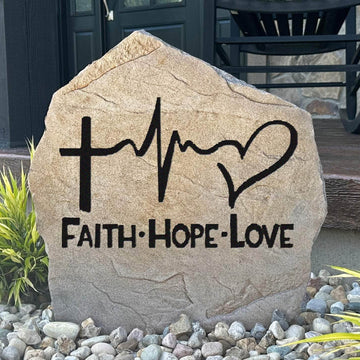 Faith Hope Love engraved garden stone displaying an uplifting message that brings inspiration and beauty to outdoor living spaces and home landscapes.