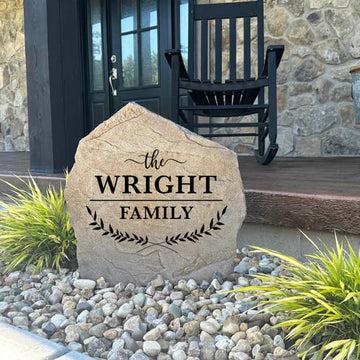 Decorative Family Name Leaf Stone with custom family names and graceful leaf accents permanently engraved into the stone. This personalized outdoor sign brings elegance and charm to flower beds, porches, and landscape borders.