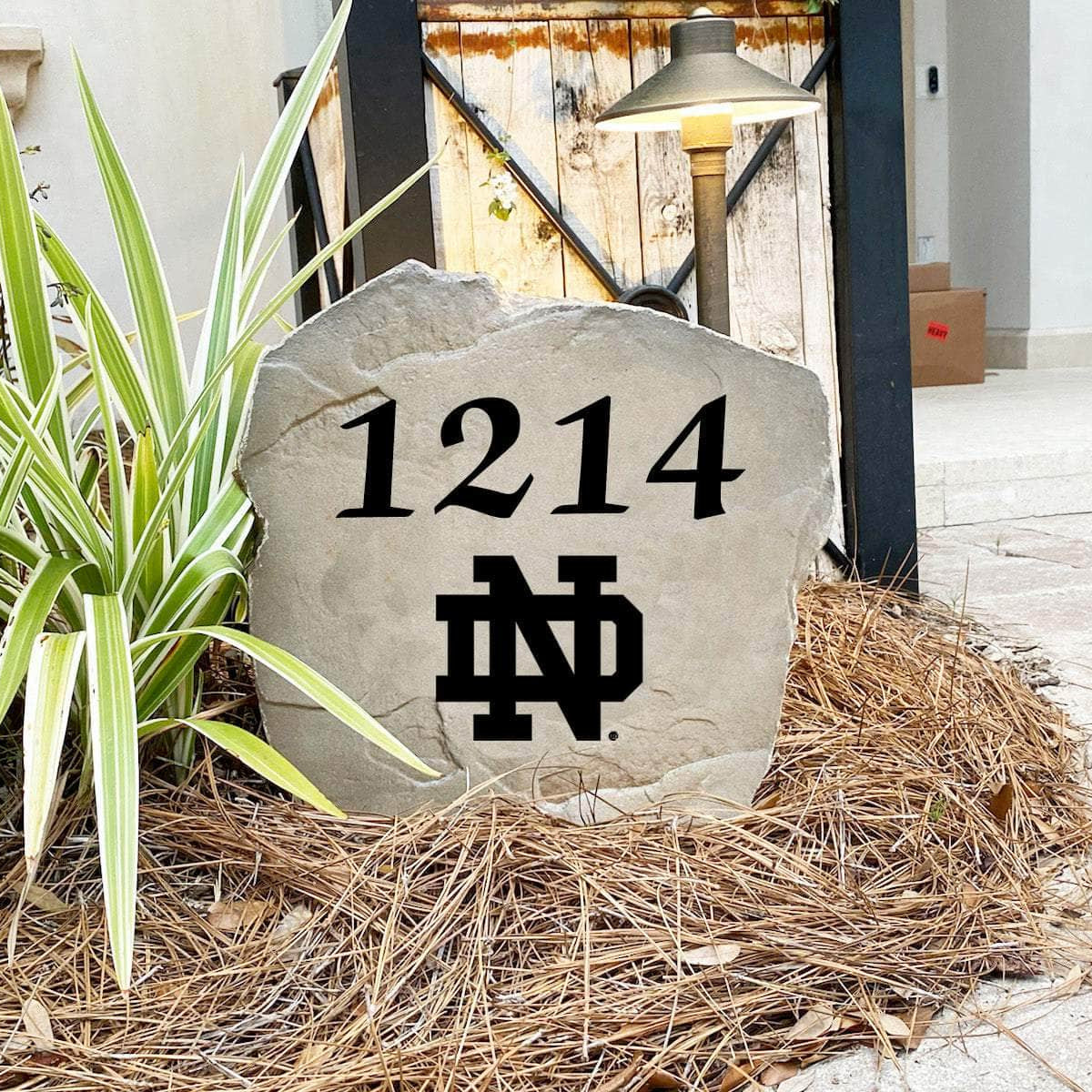 Engraved University of Notre Dame Address Stone with custom house numbers and the Fighting Irish logo, bringing collegiate spirit and timeless style to front yard landscapes, walkways, and home entrances.