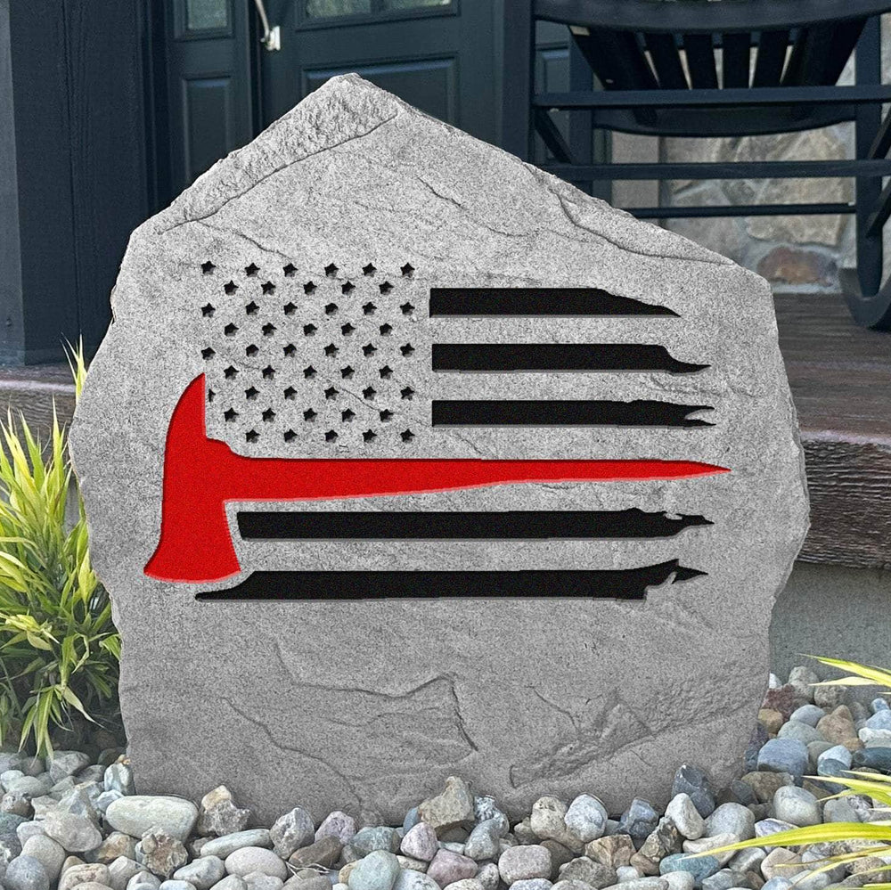 Fireman Flag engraved stone honoring the bravery and sacrifice of firefighters with a patriotic outdoor landscape tribute built to last.
