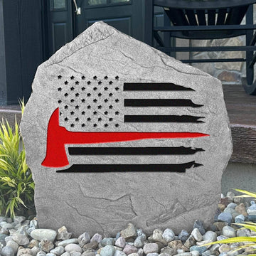 Fireman Flag engraved stone honoring the bravery and sacrifice of firefighters with a patriotic outdoor landscape tribute built to last.