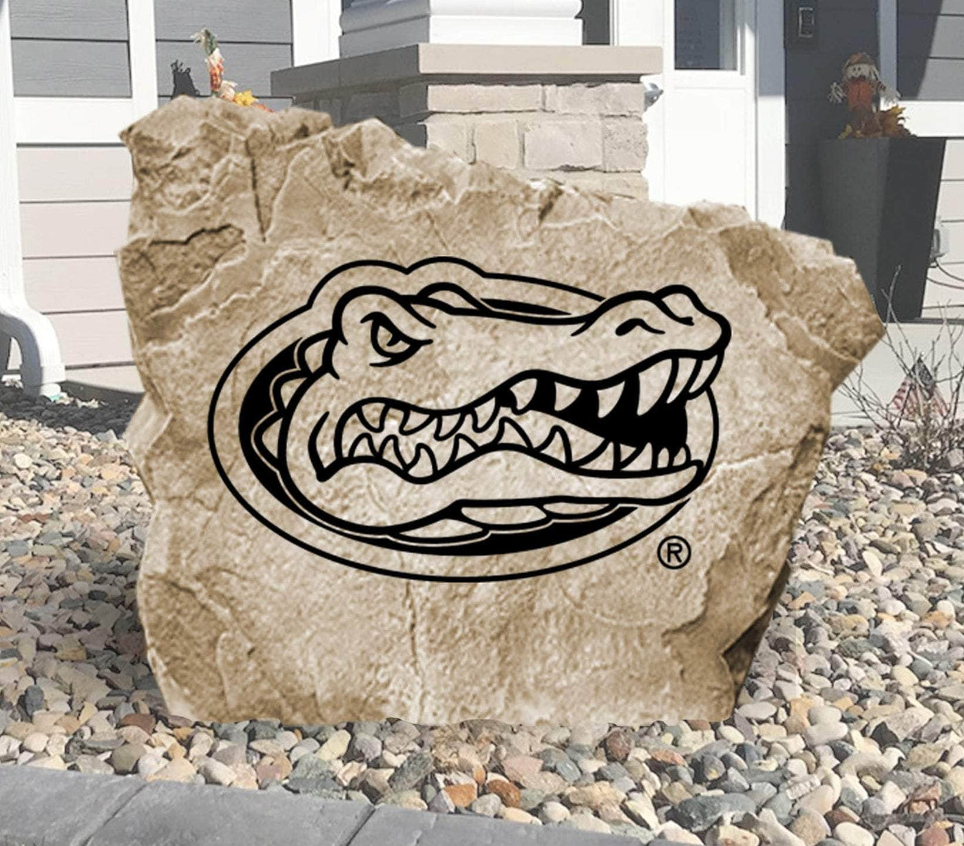 Official Florida Gators logo engraved on a decorative stone.