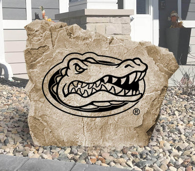 Official Florida Gators logo engraved on a decorative stone.